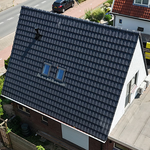 Hellend dak laten renoveren